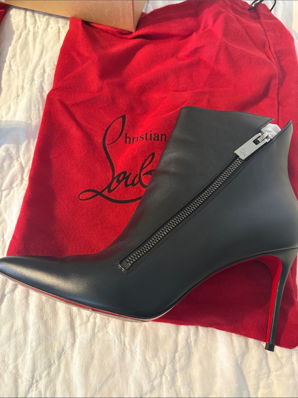 Christian Louboutin Birgikate 85 Calf Black Leather Zip Ankle Boot with Red Sole